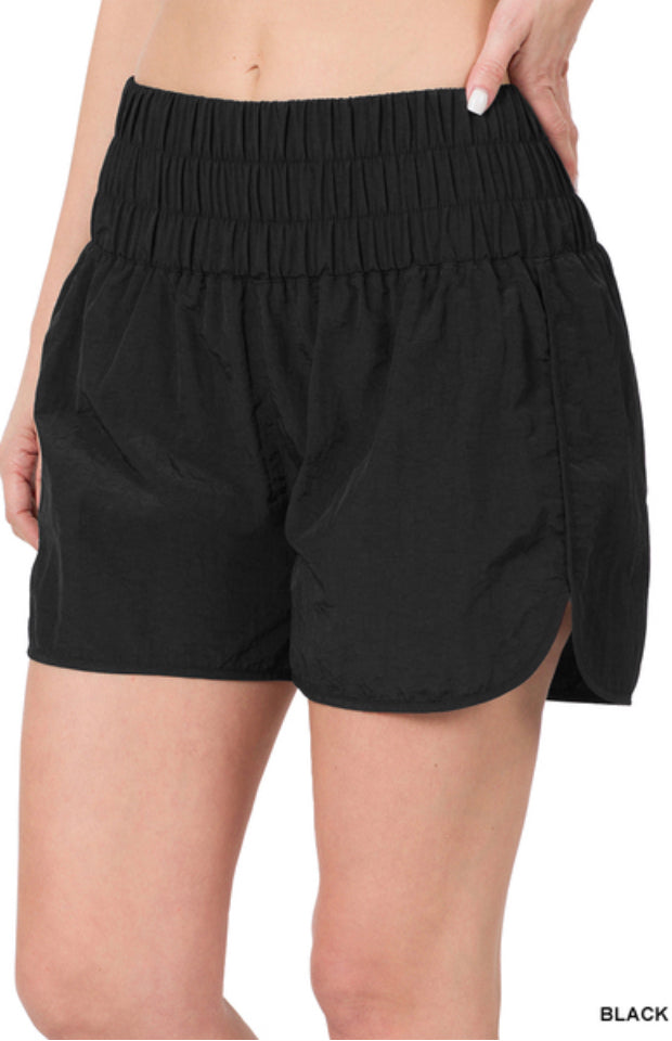 Black smocked shorts